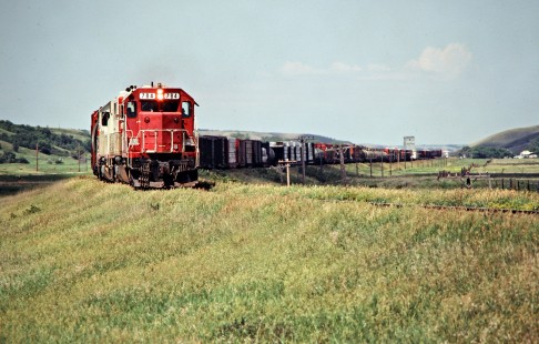 Eastbound Soo Line Railroad freight train near Donnybrook, North Dakota, on July 6, 1980. Photograph by John F. Bjorklund, © 2016, Center for Railroad Photography and Art. Bjorklund-83-07-05
