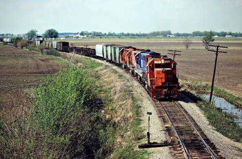 Southbound Detroit, Toledo and Ironton Railroad freight train at Norfolk and Western in Leipsic, Ohio, on May 8, 1982. Photograph by John F. Bjorklund, © 2016, Center for Railroad Photography and Art. Bjorklund-52-11-10