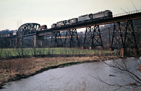 Westbound Western Maryland Railway freight train crossing bridge in Connellsville, Pennsylvania, on March 21, 1975. Photograph by John F. Bjorklund, © 2016, Center for Railroad Photography and Art. Bjorklund-92-01-21