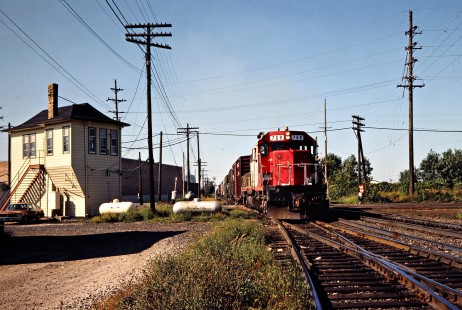 Southbound Soo Line Railroad freight train at Franklin Park, Illinois, crossing Milwaukee Road tracks in September 1982. Photograph by John F. Bjorklund, © 2016, Center for Railroad Photography and Art. Bjorklund-83-20-01