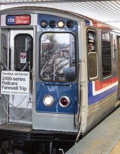 Chicago Transit’s Ravenswood Yard reflected in a 2400-series car at Ravenswood Station on January 21, 2015. Read more at <a href="http://www.railphoto-art.org/2015-awards" rel="nofollow">www.railphoto-art.org/2015-awards</a>