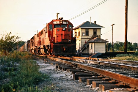 Southbound Detroit, Toledo and Ironton Railroad freight train  on Baltimore and Ohio at Tower CG in Columbus Grove, Ohio, on May 23, 1976. Photograph by John F. Bjorklund, © 2016, Center for Railroad Photography and Art. Bjorklund-50-23-09