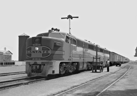 Engineer of Oakland-bound Santa Fe local no. 7 eases forward to line up train with baggage carts at Wasco, California, in June 1950. Photograph by J. Parker Lamb, © 2016, Center for Railroad Photography and Art. Lamb-02-039-03