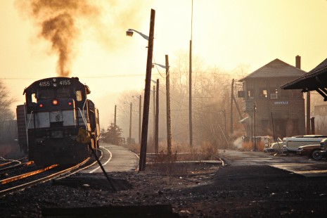 Eastbound Conrail (ex-Erie Lackawanna) commuter passenger train in Denville, New Jersey, on November 27, 1981. Photograph by John F. Bjorklund, © 2015, Center for Railroad Photography and Art. Bjorklund-57-25-05