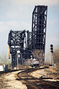Amtrak passenger train crossing the St. Charles Air Line bridge at 16th Street in Chicago, Illinois, on April 17, 1981. Photograph by John F. Bjorklund, © 2016, Center for Railroad Photography and Art. Bjorklund-60-16-02