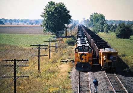 Southbound and northbound Baltimore and Ohio Railroad coal trains meet in Leipsic, Ohio, on September 28, 1975. Photograph by John F. Bjorklund, © 2016, Center for Railroad Photography and Art. Bjorklund-92-16-10