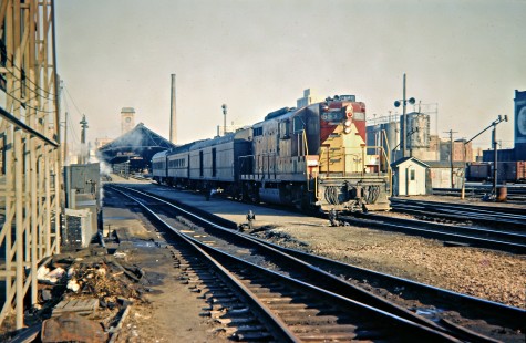 Soo Line Railroad passenger train no. 10, the <i>Winnipeger</i>, leaving the Milwaukee Road depot at Minneapolis, Minnesota, in April 1966. Photograph by John F. Bjorklund, © 2016, Center for Railroad Photography and Art. Bjorklund-83-01-18