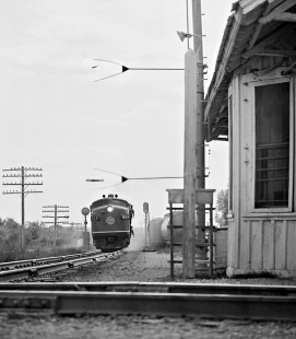 Two crewmen on northbound Missouri Pacific local freight train are set to pick up orders at McNeil station in June 1966. Photograph by J. Parker Lamb, © 2016, Center for Railroad Photography and Art. Lamb-02-062-04