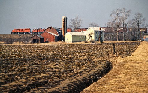 Southbound Detroit, Toledo and Ironton Railroad freight train in Delta, Ohio, on March 15, 1980. Photograph by John F. Bjorklund, © 2016, Center for Railroad Photography and Art. Bjorklund-51-25-12