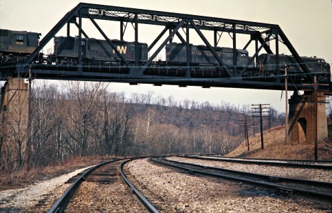 Westbound Western Maryland Railway freight train crossing bridge over the Baltimore & Ohio main line in Connellsville, Pennsylvania, on March 21, 1975. Photograph by John F. Bjorklund, © 2016, Center for Railroad Photography and Art. Bjorklund-92-01-18