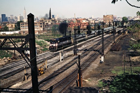 Westbound Conrail (ex-Erie Lackawanna) commuter passenger train in Hoboken, New Jersey, on May 8, 1981. Photograph by John F. Bjorklund, © 2015, Center for Railroad Photography and Art. Bjorklund-57-18-19