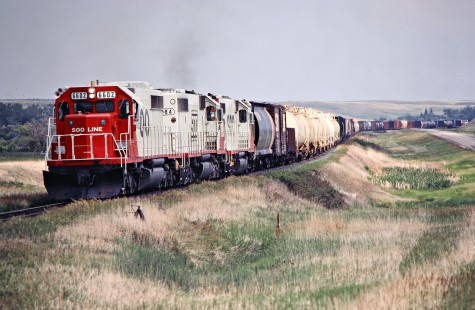 Westbound Soo Line Railroad freight train near Foxholm, North Dakota, on July 5, 1980. Photograph by John F. Bjorklund, © 2016, Center for Railroad Photography and Art. Bjorklund-83-05-21