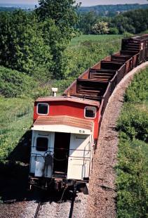 Caboose of a westbound Soo Line Railroad freight train near Byron, Wisconsin, on May 25, 1975. Photograph by John F. Bjorklund, © 2016, Center for Railroad Photography and Art. Bjorklund-83-03-14