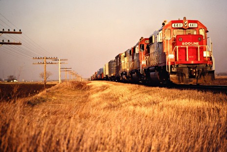 Westbound Soo Line Railroad freight train near Paynesville, Minnesota, on April 17, 1981. Photograph by John F. Bjorklund, © 2016, Center for Railroad Photography and Art. Bjorklund-83-17-04
