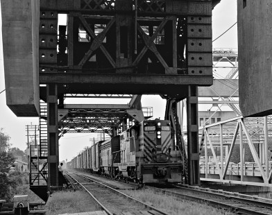 Northbound Texas and Pacific Railway freight train on bascule bridge at Plaquemine, Louisiana, in August 1975. Photograph by J. Parker Lamb, © 2016, Center for Railroad Photography and Art. Lamb-02-079-02