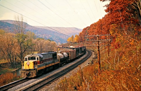 Eastbound Erie Lackawanna Railway freight train in Adrian, New York, on October 17, 1974. Photograph by John F. Bjorklund, © 2016, Center for Railroad Photography and Art. Bjorklund-54-26-03