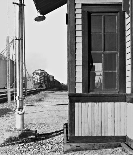 Southbound Missouri–Kansas–Texas Railroad local freight train passes a closed station in Granger, Texas, in late afternoon during February 1973. Photograph by J. Parker Lamb, © 2016, Center for Railroad Photography and Art. Lamb-02-045-11