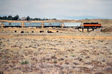 Eastbound Cadillac and Lake City Railway freight train at Genoa, Colorado, (on the former Rock Island) on September 30, 1983. Photograph by John F. Bjorklund, © 2016, Center for Railroad Photography and Art. Bjorklund-82-12-13