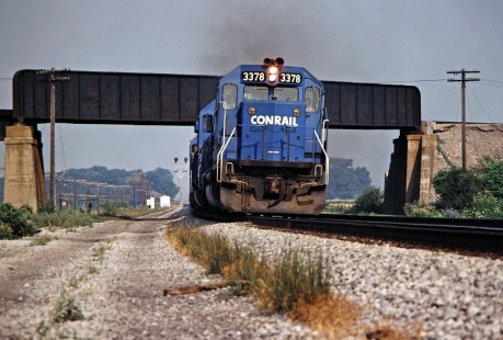Eastbound Conrail freight train near Oak Harbor, Ohio, on July 26, 1980. Photograph by John F. Bjorklund, © 2016, Center for Railroad Photography and Art. Bjorklund-81-27-24