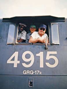 Grand Trunk Western Railroad train crew for GTW commuter passenger train no. 999 at Brush St. Station in Detroit, Michigan, on June 22, 1973. Photograph by John F. Bjorklund, © 2016, Center for Railroad Photography and Art. Bjorklund-58-15-15