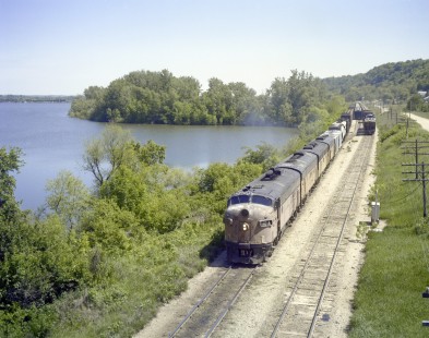 Milwaukee Road diesel locomotive no. 110A, leads westbound freight train no. 107 between Savanna and Cedar Rapids. Image shot on May 27, 1979 near Samoa, Iowa. Photograph by Victor Hand. Hand-MILW-C67-09