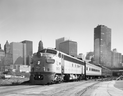 Milwaukee Road diesel locomotive no. 95C departs Chicago's Union Station with northbound commuter train on October 5, 1973. Photograph by Victor Hand. Hand-MILW-67-030