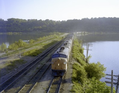 Milwaukee Road diesel locomotive no. 86A leads eastbound freight train no. 106 between Cedar Rapids and Savanna on May 28, 1979. image shot near Sabula, Iowa. Photograph by Victor Hand. Hand-MILW-C67-11.