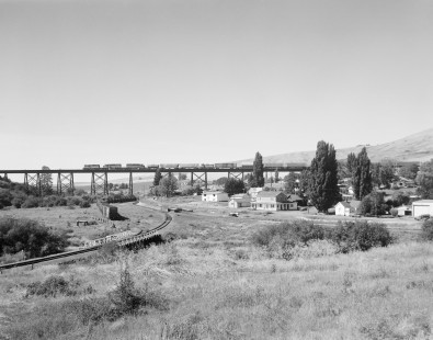 Westbound Milwaukee Road freight train no. 201 crosses trestle bridge at Tekoa, Washington, on September 11, 1979. Photograph by Victor Hand. Hand-MILW-67-130