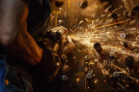 A worker grinds boiler staybolts in preparation to peen the end over, sealing them into the boiler sheet, at Valley Railroad Shops, in Essex, Connecticut, on August 7, 2018.

Read more about the <a href="http://www.railphoto-art.org/awards/2019-awards/" rel="noreferrer nofollow">2019 John E. Gruber Creative Photography Awards Program</a>.