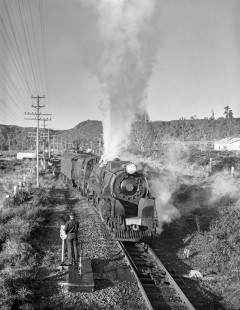 New Zealand Government Railways steam locomotive no. 1216 hauls freight near Kaimata in the New Plymouth District of New Zealand's North Island on June 10, 1967. Photograph by Victor Hand. Hand-NZGR-12-0999
