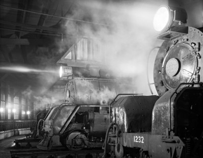 New Zealand Government Railways steam locomotive not. 1232 and 1212 in shop at Greymouth on the South Island of New Zealand on June 9, 1967. Photograph by Victor Hand.Hand-NZGR-12-0986.