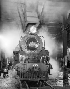 New Zealand Government Railways steam locomotive no. 1209 in shop at Greymouth on the South Island of New Zealand on June 9, 1967. Photograph by Victor Hand. Hand-NZGR-12-0985.