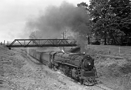 Lehigh and Hudson River Railway 4-8-2 steam locomotive no. 12 pulling a freight west under a road bridge at Craigville, New York, on May 6, 1945. Photograph by Donald W. Furler, Furler-01-012-01, © 2017, Center for Railroad Photography and Art