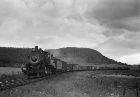 Lehigh and Hudson River Railway 2-8-0 camelback steam locomotive no. 60 pulling the Warwick-Maybrook transfer freight train at Sugar Loaf, New York, on November 5, 1944. Photograph by Donald W. Furler, Furler-01-019-02, © 2017, Center for Railroad Photography and Art