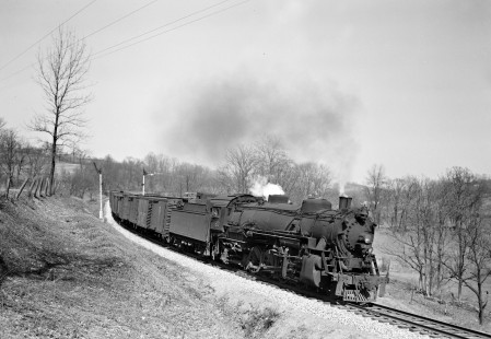 Lehigh and Hudson River Railway 2-8-2 steam locomotive no. 83 pulling a Warwick-Port Morris freight train west past semaphore signals at Craigville, New York, on March 24, 1946. Photograph by Donald W. Furler, Furler-01-055-01, © 2017, Center for Railroad Photography and Art