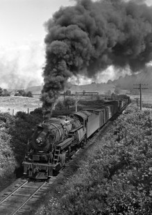 Lehigh and Hudson River Railway 2-8-0 steam locomotive no. 91 pulls a freight train through Sugar Loaf, New York, on August 5, 1945. Photograph by Donald W. Furler, Furler-01-074-02, © 2017, Center for Railroad Photography and Art