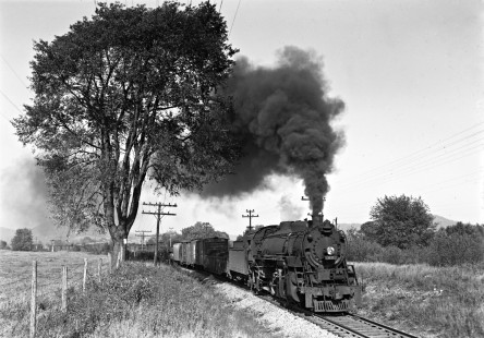 Lehigh and Hudson River 2-8-2 locomotive 80 rolls a freight train west through through Lake, New York, on October 8, 1950, the last year for steam operations on the railroad. Photograph by Donald W. Furler, Furler-22-018-01, © 2017, Center for Railroad Photography and Art