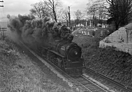 Lehigh and Hudson River Railway 4-8-2 steam locomotive no. 11 pulling freight train HO6 east past a cemetery at Craigville, New York, on November 5, 1944. Photograph by Donald W. Furler, Furler-01-010-02, © 2017, Center for Railroad Photography and Art