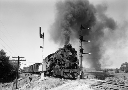 Lehigh and Hudson River 2-8-0 locomotive 92 splits the semaphore signals at Lake, New York, with an afternoon train from Maybrook to Allentown in 1950, the last year for steam operations on the railroad. Photograph by Donald W. Furler, Furler-01-085-01, © 2017, Center for Railroad Photography and Art