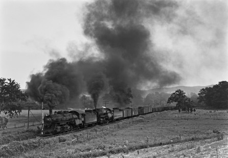 Lehigh and Hudson River steam locomotives 72 and 91, a 2-8-2 and 2-8-0, team up to move a freight train east at Ryerson's Crossing new Warwick, New Jersey, on June 5, 1949. Photograph by Donald W. Furler, Furler-22-011-01, © 2017, Center for Railroad Photography and Art