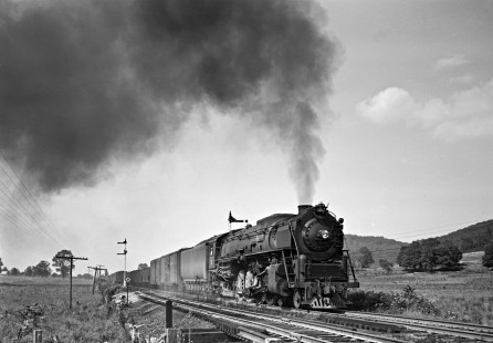 Lehigh and Hudson River Railway 4-8-2 steam locomotive no. 11 pulling a freight west past semaphore signals in Sugar Loaf, New York, in June 1945. Photograph by Donald W. Furler, Furler-01-006-02, © 2017, Center for Railroad Photography and Art