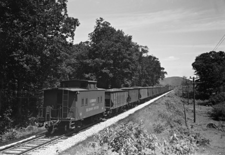 Lehigh and Hudson River Railway caboose no. 12 at the rear of freight train HO6 at Lake, New York, on August 5, 1945. Photograph by Donald W. Furler, Furler-01-013-01, © 2017, Center for Railroad Photography and Art