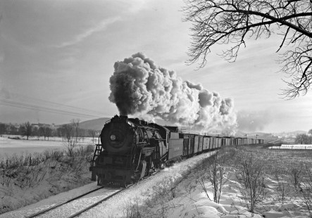 Lehigh and Hudson River Railway 2-8-0 steam locomotive no. 90 steams east with a freight train through snowy Craigville, New York, on December 2, 1945. Photograph by Donald W. Furler, Furler-01-067-01, © 2017, Center for Railroad Photography and Art