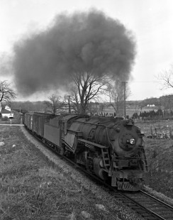 Lehigh and Hudson River Railway 2-8-0 steam locomotive no. 93 steams west through Prices Siding, New Jersey, with a ninety-eight-car Burnside-Belvidere freight train on March 30, 1946. Photograph by Donald W. Furler, Furler-01-090-02, © 2017, Center for Railroad Photography and Art