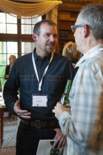Travis and Dewitz and Eric Williams at the Friday reception. CRP&A Conversations 2019 photograph by Henry A. Koshollek