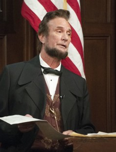 Abraham Lincoln, played by Michael Krebs, contemplates signing the Pacific Railway Act in "Lincoln and the Railroad," a one-act play by the National Railroad Hall of Fame performed at the Friday dinner. CRP&A Conversations 2019 photograph by Henry A. Koshollek