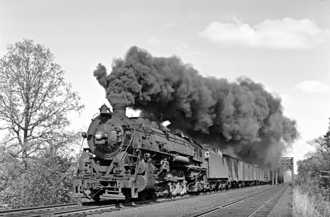 New York, Ontario and Western 4-8-2 steam locomotive 457 leading a westbound freight train at Stony Ford, New York, on March 23, 1946.  Photograph by Donald W. Furler, Furler-13-026-01, © 2017, Center for Railroad Photography and Art