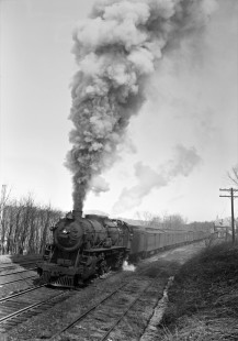 New York, Ontario and Western 4-8-2 steam locomotive 408 leading train no. 9 out of Firthcliff, New York, behind train no. 1, on March 23, 1946. Photograph by Donald W. Furler, Furler-13-022-02, © 2017, Center for Railroad Photography and Art