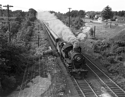 New York Ontario and Western Railway 4-6-0C steam locomotive 246 leading eastbound passenger train np. 36 with 10 cars at Fair Oaks, New York, on July 7, 1940. Photograph by Donald W. Furler, Furler-03-082-01. © 2017, Center for Railroad Photography and Art