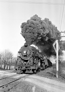 New York, Ontario and Western 4-8-2 steam locomotive 457 leading a westbound freight train at Stony Ford, New York, on March 23, 1946. Photograph by Donald W. Furler, Furler-13-028-01, © 2017, Center for Railroad Photography and Art